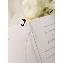 Embossed bride detail; opened wedding invite